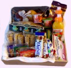 Deliver a hamper containing a selection of cheeses, muesli, coffee, tea, rusks, jams, bagels, yoghurt,
 muffins, juice and oats bars - click to enlarge